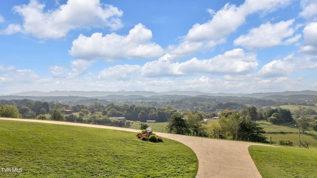 property view of mountains featuring a rural view