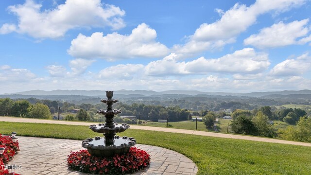 exterior space featuring a mountain view