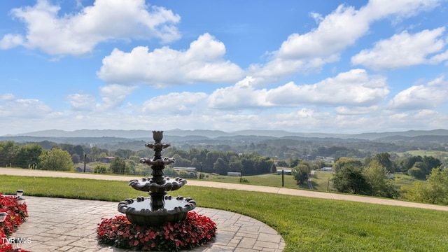 view of mountain feature with a rural view