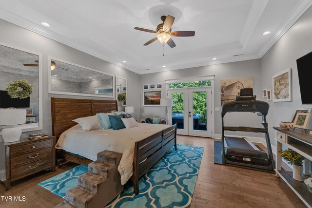 bedroom featuring ornamental molding, access to outside, ceiling fan, french doors, and hardwood / wood-style flooring