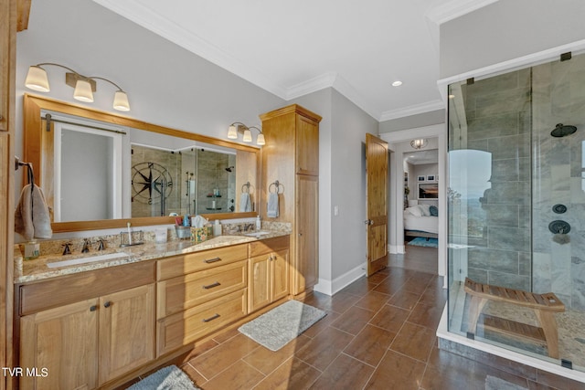 full bath featuring ensuite bath, ornamental molding, a stall shower, and a sink