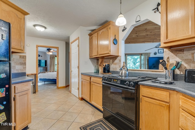 kitchen with light tile patterned flooring, backsplash, ceiling fan, and black appliances