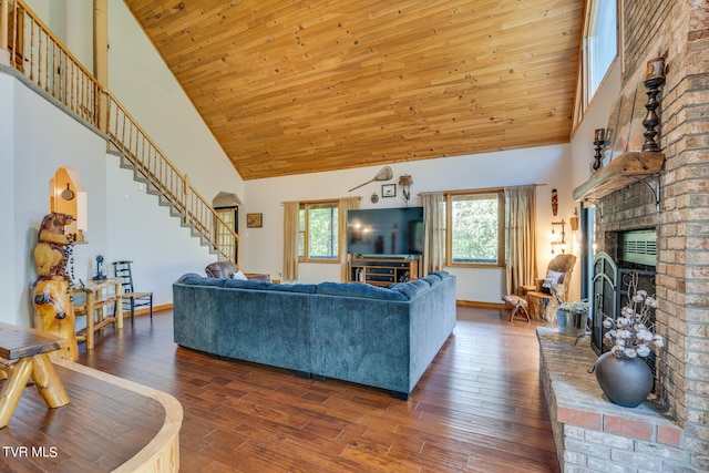 living room with dark hardwood / wood-style floors, wood ceiling, a fireplace, and high vaulted ceiling