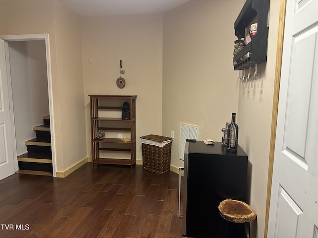 interior space with dark hardwood / wood-style floors