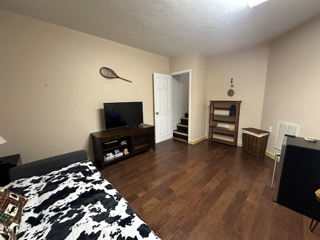 living room with dark hardwood / wood-style floors