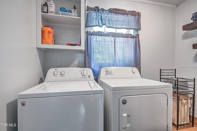 washroom featuring separate washer and dryer