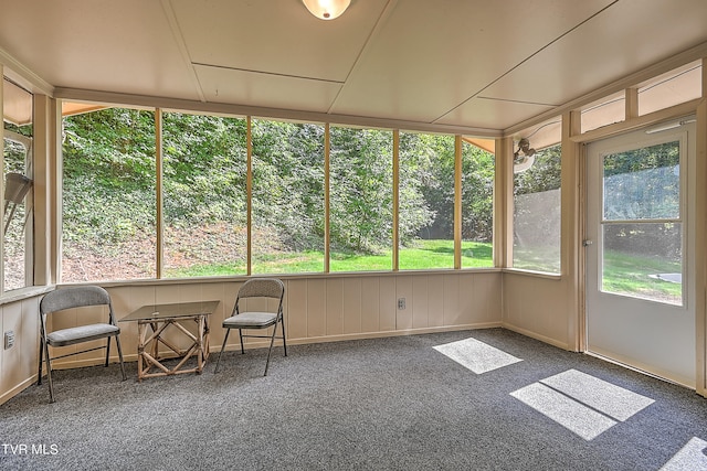 unfurnished sunroom featuring plenty of natural light