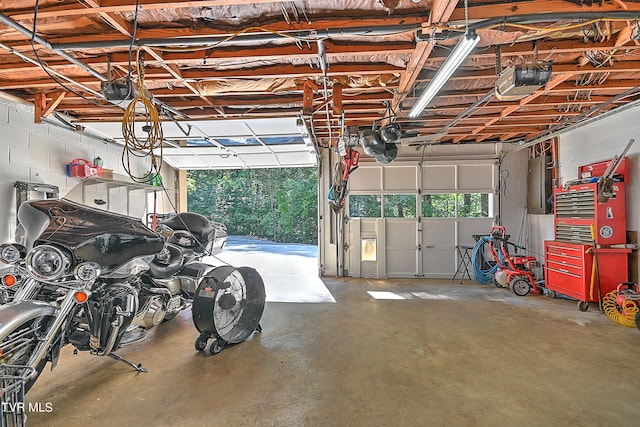 garage featuring a garage door opener