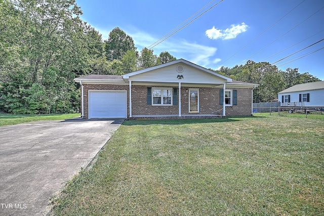 ranch-style house featuring a front lawn, an attached garage, brick siding, and driveway