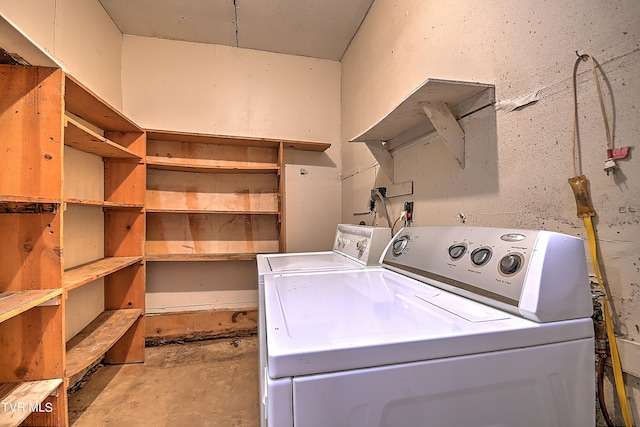 laundry area featuring washing machine and dryer