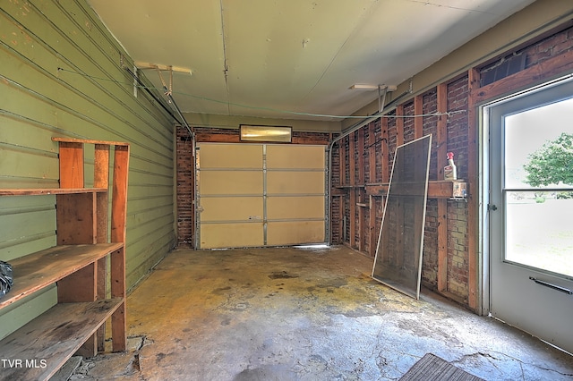 garage with wood walls