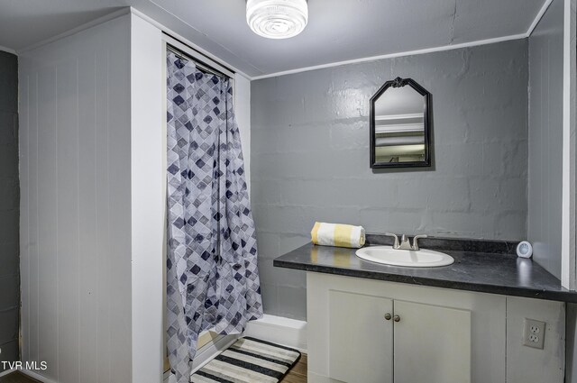 bathroom featuring vanity and a shower with shower curtain