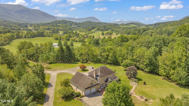 drone / aerial view featuring a mountain view