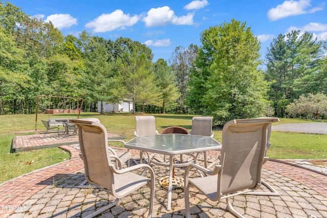 view of patio featuring a storage shed