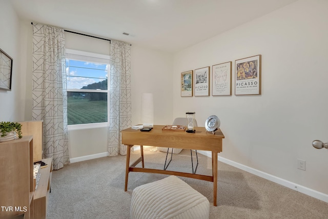 office space with carpet flooring and baseboards