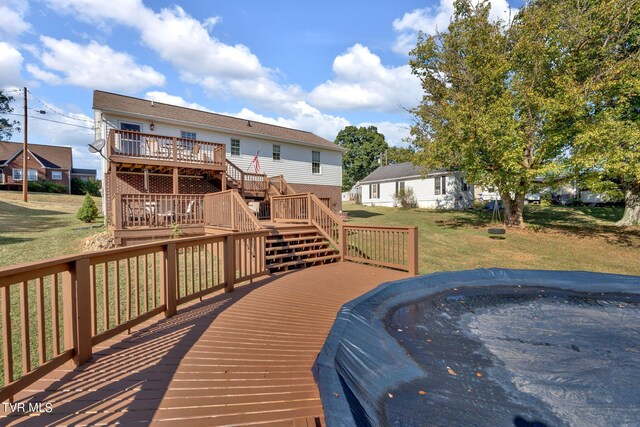 deck featuring a yard