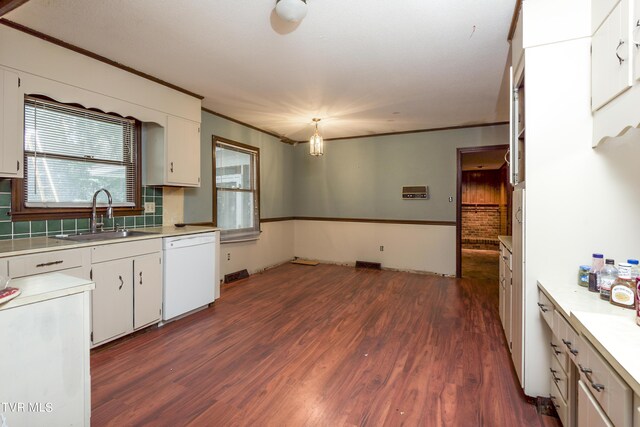 kitchen with white dishwasher, dark hardwood / wood-style floors, white cabinetry, and sink