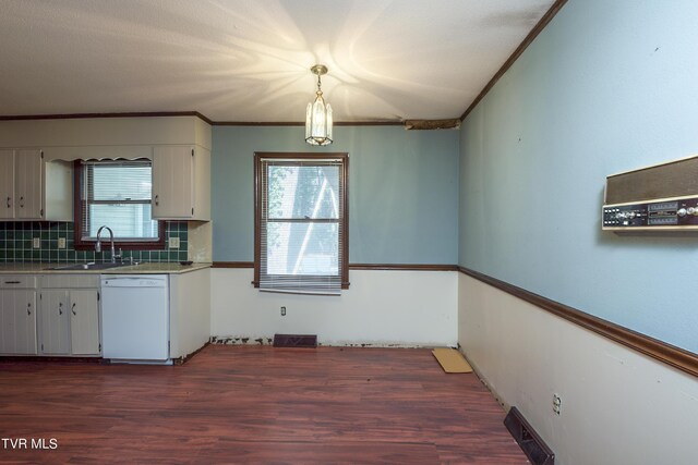 kitchen featuring ornamental molding, dishwasher, sink, dark hardwood / wood-style floors, and white cabinets