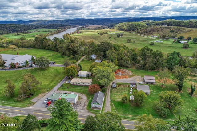 drone / aerial view with a rural view and a water view