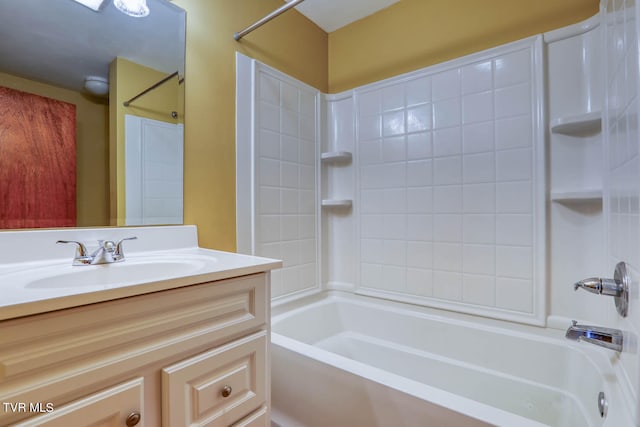 bathroom with vanity and tiled shower / bath combo