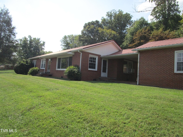 ranch-style home with a front lawn