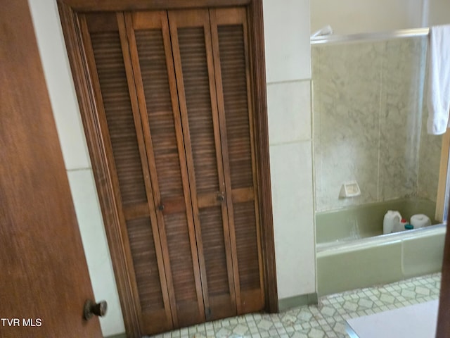 bathroom featuring  shower combination