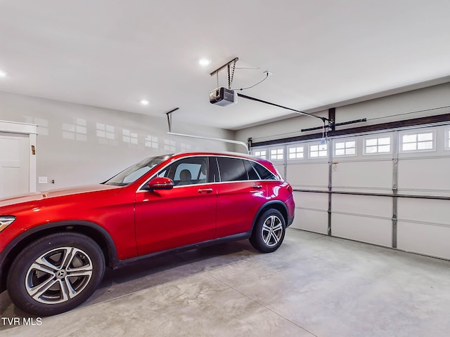 garage featuring a garage door opener