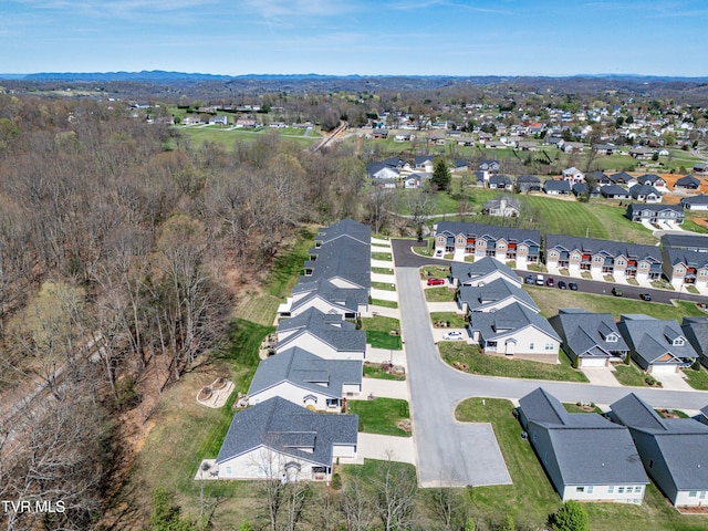 birds eye view of property with a residential view