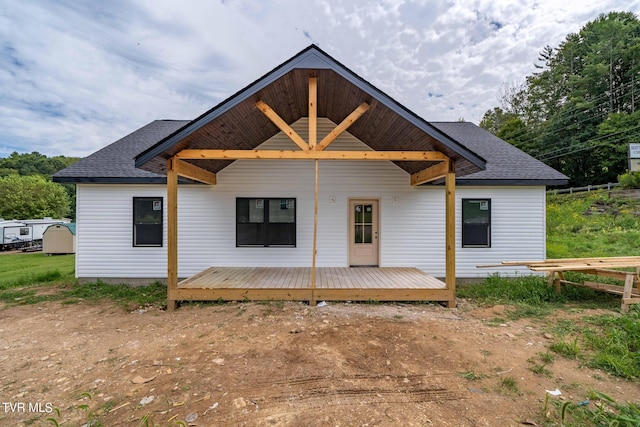 rear view of house with a deck