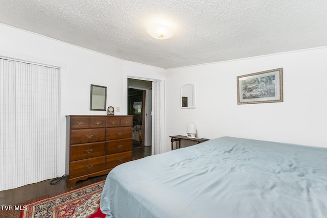 bedroom with a textured ceiling