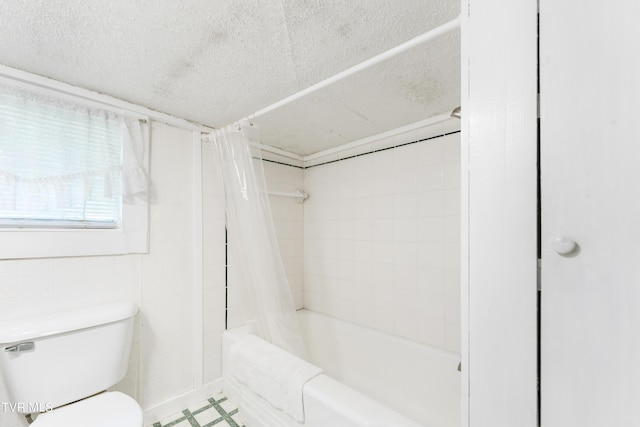 bathroom featuring toilet and shower / tub combo with curtain