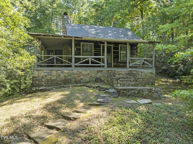 view of outdoor structure featuring a porch