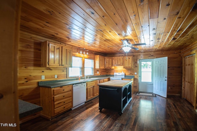 kitchen with white appliances, a center island, ceiling fan, dark hardwood / wood-style floors, and wood ceiling