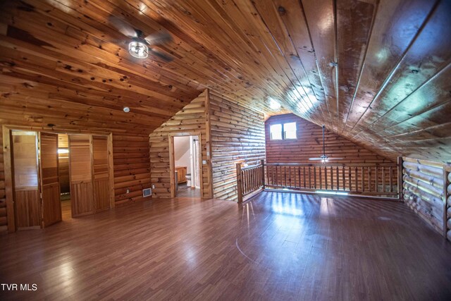 additional living space featuring ceiling fan, dark hardwood / wood-style flooring, wooden ceiling, and vaulted ceiling