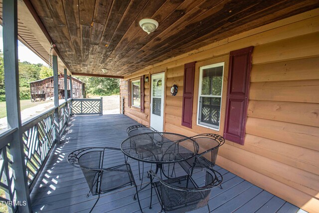 wooden deck with a porch