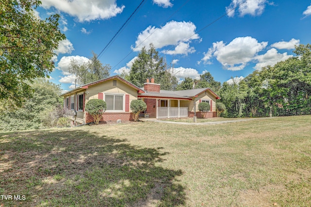 ranch-style house with a front lawn