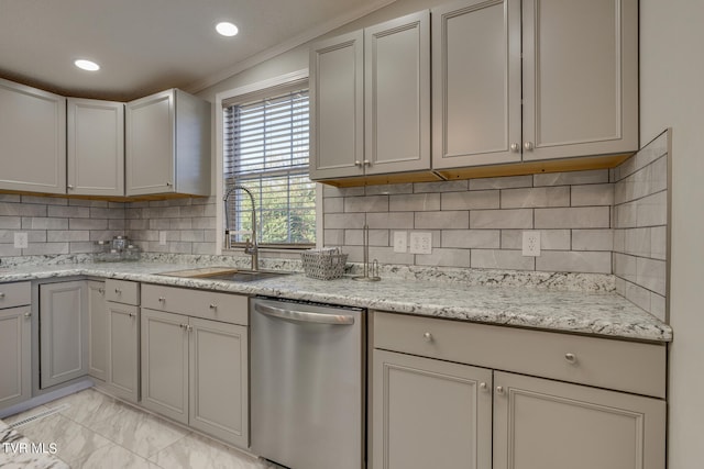 kitchen featuring light stone countertops, sink, stainless steel dishwasher, tasteful backsplash, and ornamental molding