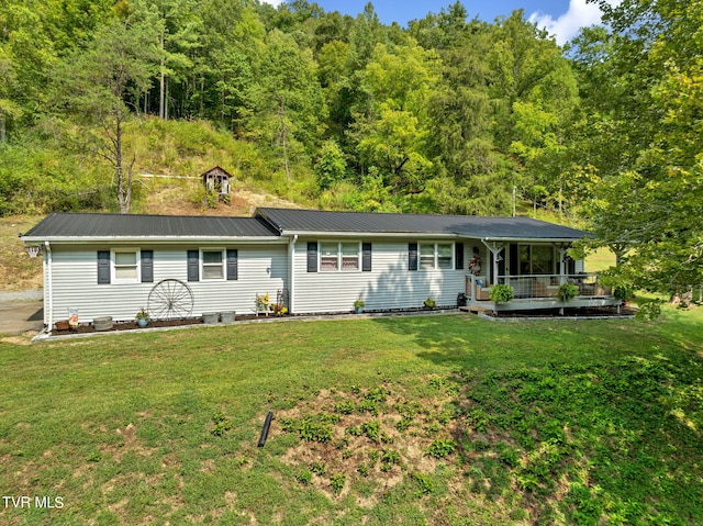 ranch-style home with a front yard