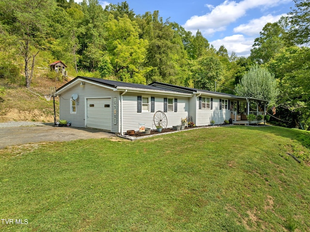 ranch-style home with a front yard and a garage