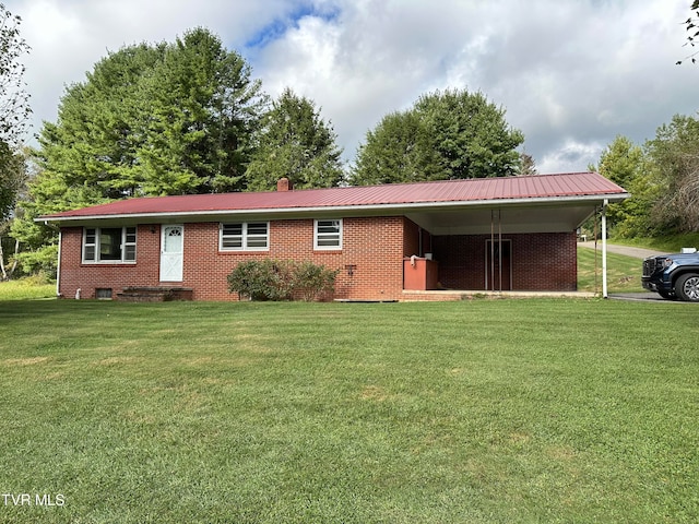 single story home featuring a carport and a front yard