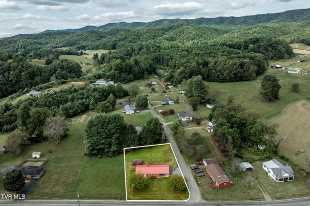 aerial view with a mountain view and a rural view