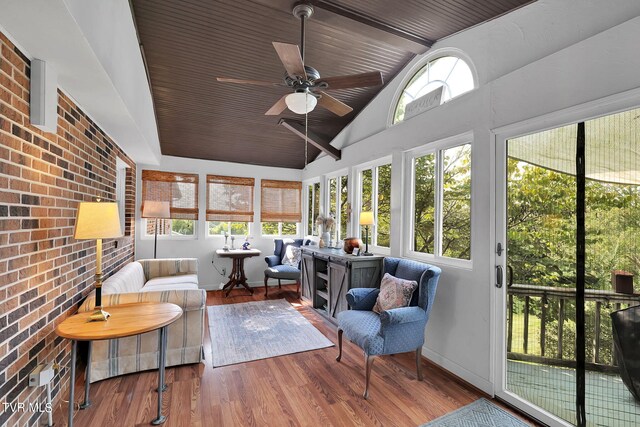 sunroom / solarium with ceiling fan