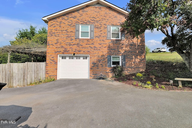 exterior space with a garage