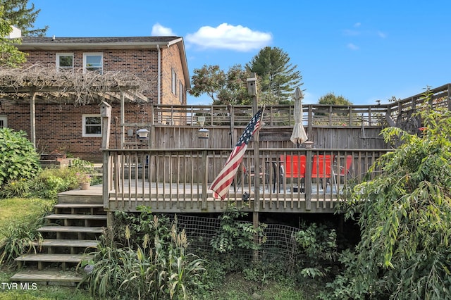 exterior space featuring a wooden deck