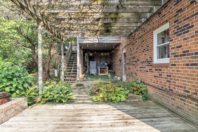 wooden terrace featuring a pergola