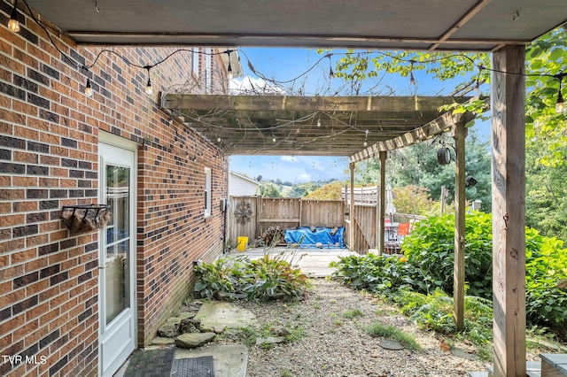 view of patio / terrace featuring a pergola