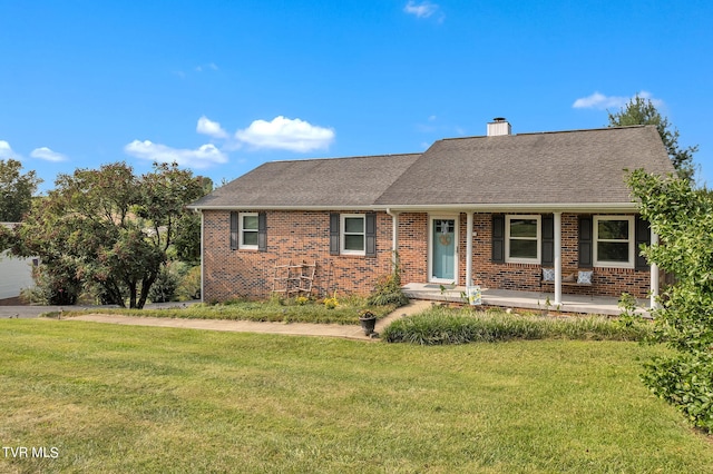 ranch-style house featuring a front lawn