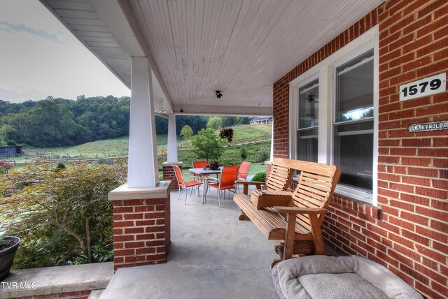 view of patio featuring covered porch