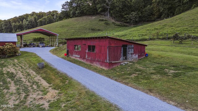 view of outdoor structure with a yard