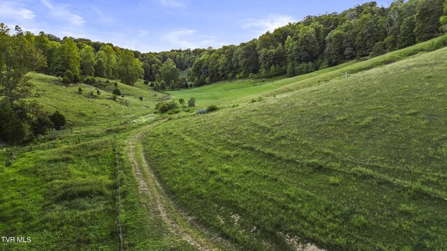 exterior space with a rural view